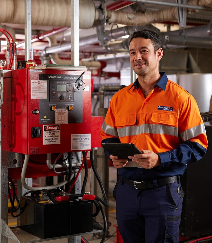 A men in front of machinery