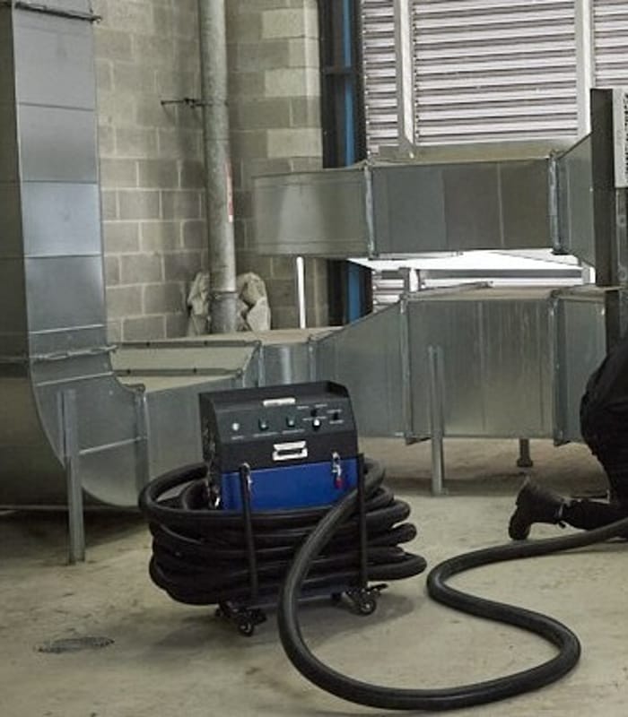 A man using a cleaning machine